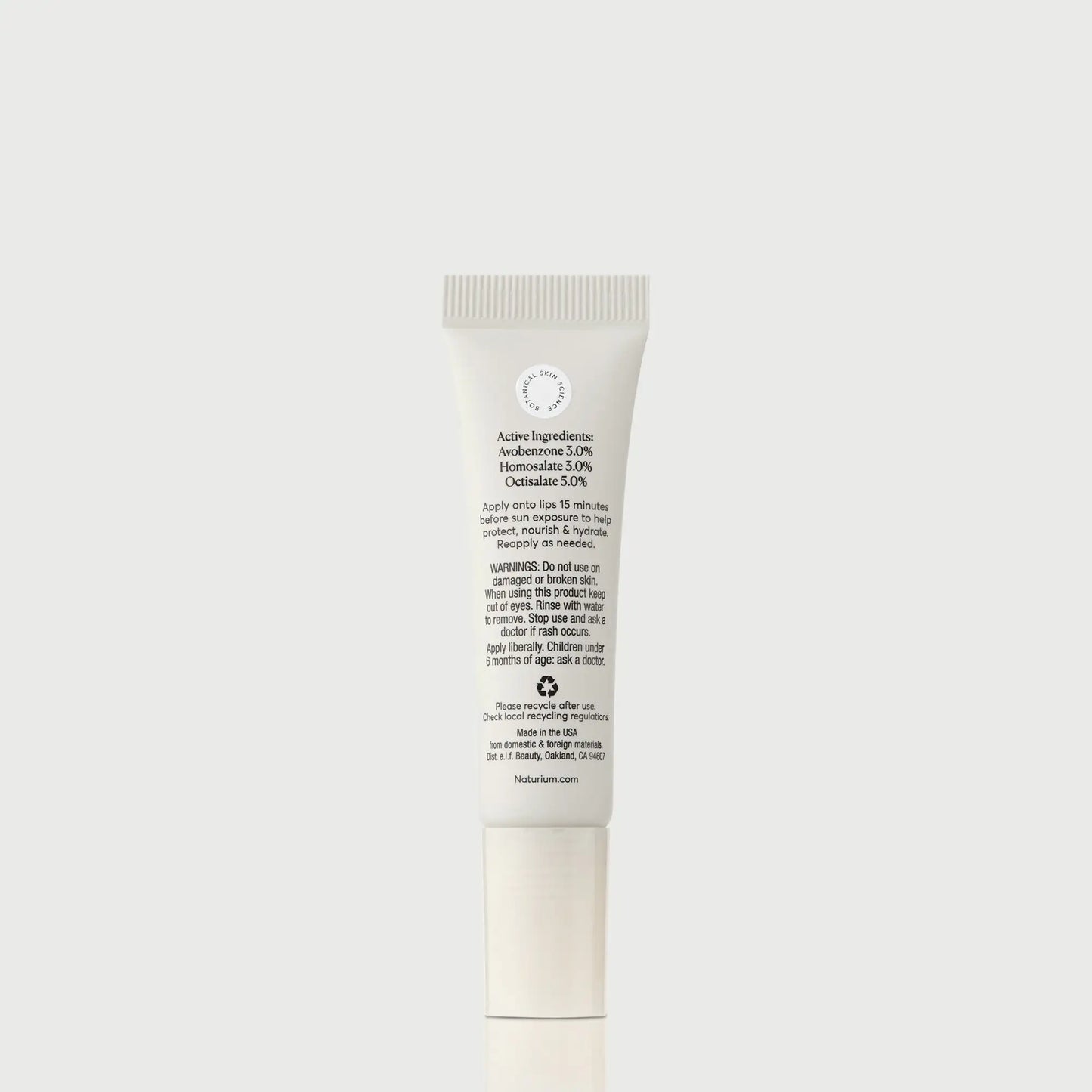 phyto-glow-lip-balm-spf-45-clear-g2 NATR-10124_PhytoGlow_SPF_Clear_primary_capon_back_bonebkgd_1.webp