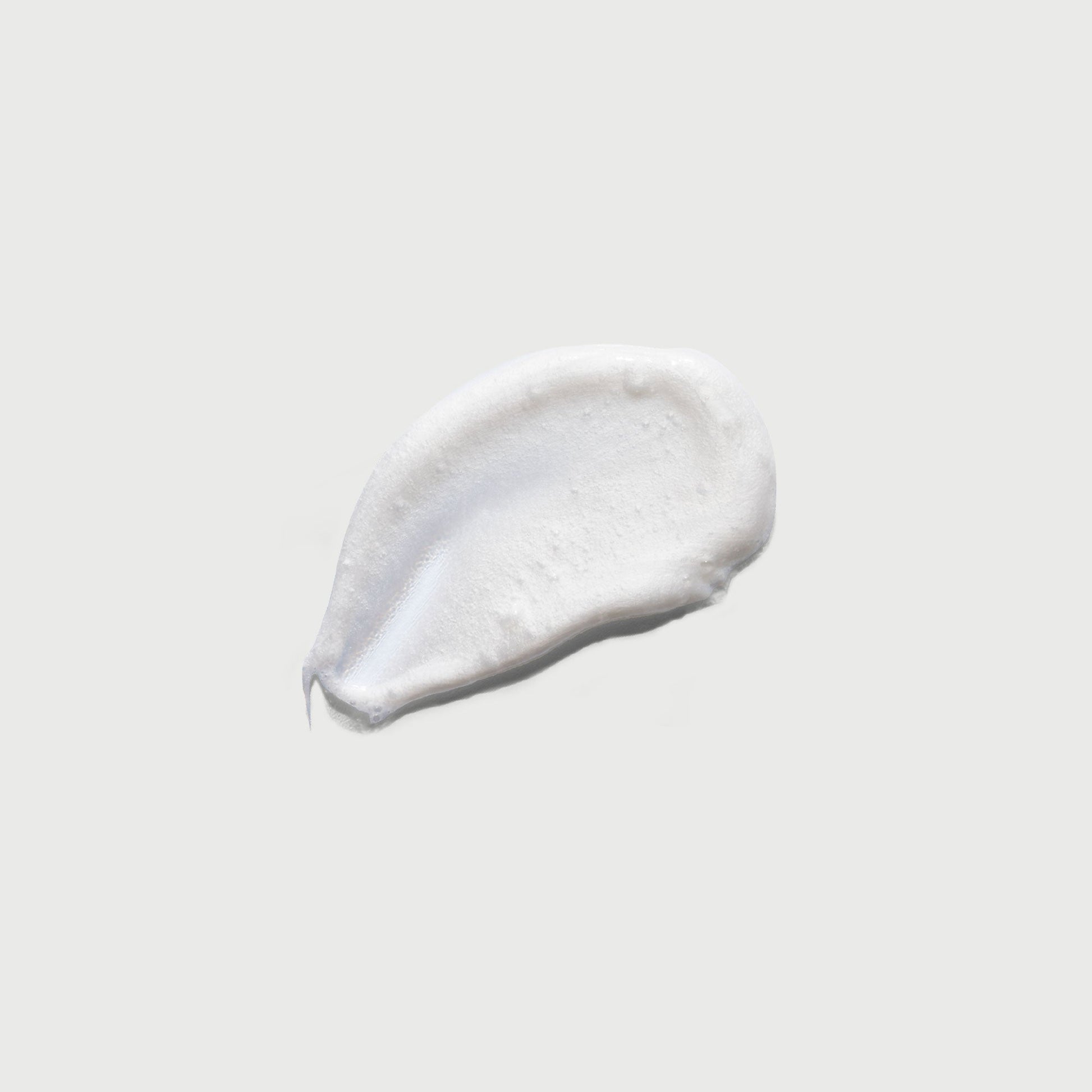 the-smoother-glycolic-acid-exfoliating-body-wash-o0 NATR-40002-Swatch-The-Smoother-Glycolic-Acid-Exfoliating-Body-Wash-bonebkgd.jpg