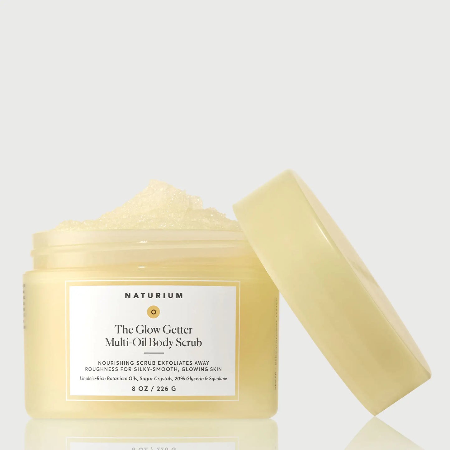 the-glow-getter-multi-oil-body-scrub-n9 NATR-40028-GlowGetter-Multi-Oil-Body-Scrub-Front-CapOff-bonebkgd.webp