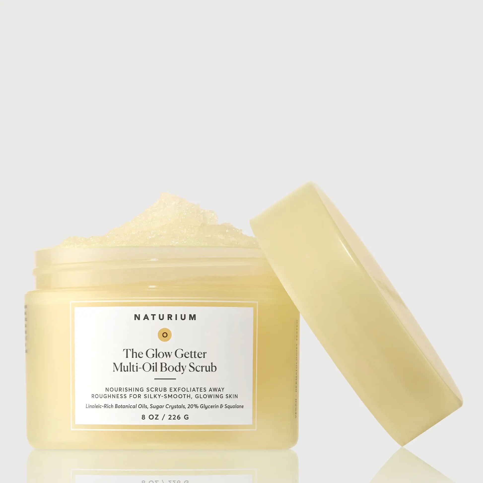 the-glow-getter-multi-oil-body-scrub-n9 NATR-40028-GlowGetter-Multi-Oil-Body-Scrub-Front-CapOff-bonebkgd.webp